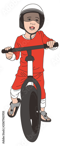 boy riding bike happily