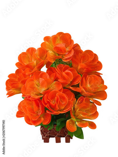 Foto Bright orange artificial flowers in a vase