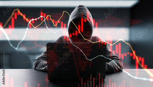 Obraz na plátně Anonymous hooded figure with laptop behind falling financial charts and glowing lines on dark background depicting risk and cyber threat concept