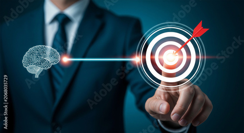 Strategic business targeting concept, businessman pointing at virtual bullseye with arrow, mental focus and brain intelligence connection
