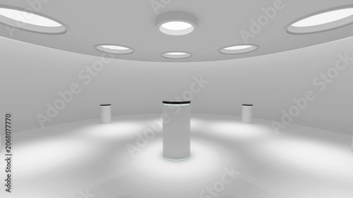 A white room with beautiful lighting, featuring a pedestal in the center for your promotional products.
