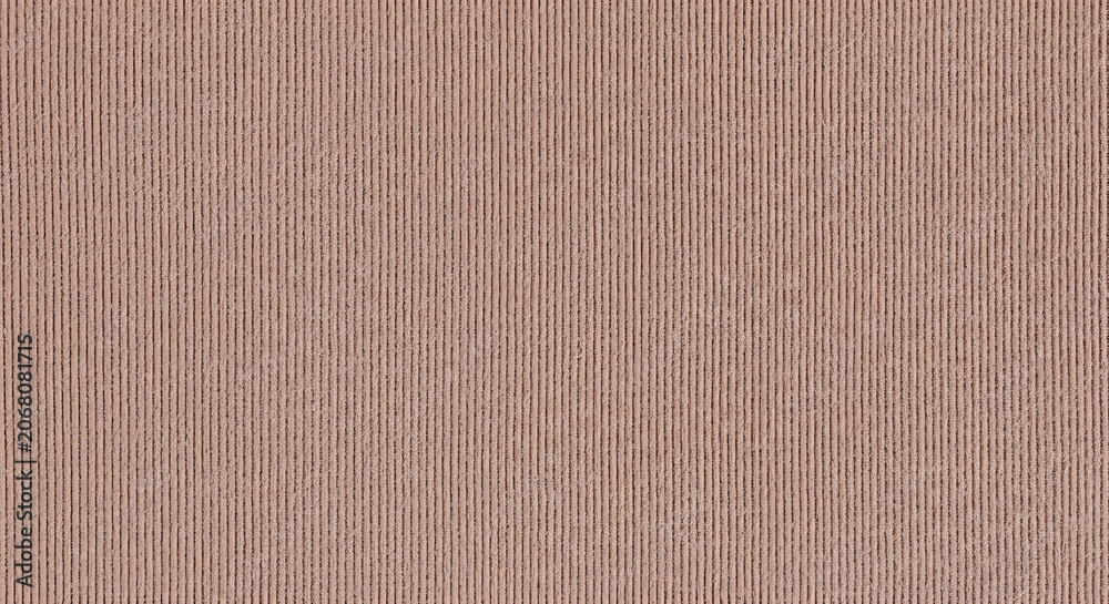 Fototapeta premium Close-up of dusty pink ribbed fabric texture, vertical lines