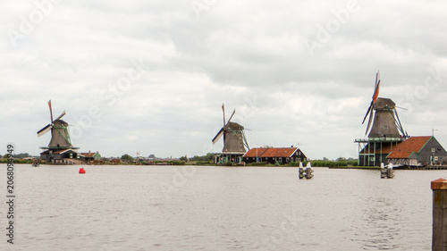 TILT SHIFT EFFECT - Panoramic view of windmills in Zaanse Schans, traditional village in the Netherlands.