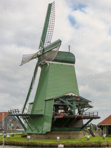 De Gekroonde Poelenburg Windmill (The Crowned Poelenburg). Traditional Dutch old wooden windmill in Zaanse Schans - museum village in Zaandam. The Netherlands.