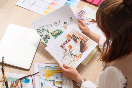Interior designer reviewing...