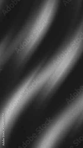 Minimalist noir background with smooth diagonal waves of dark silk fabric texture and fine grain cinematic noise.