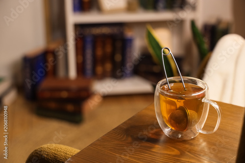 Warm herbal tea in double-w...