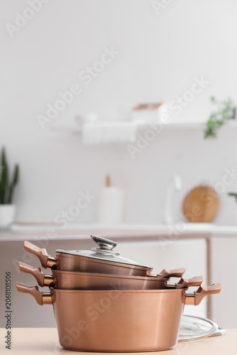 Copper cooking pots on tabl...