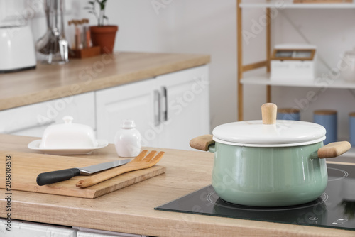 Green cooking pot on electr...