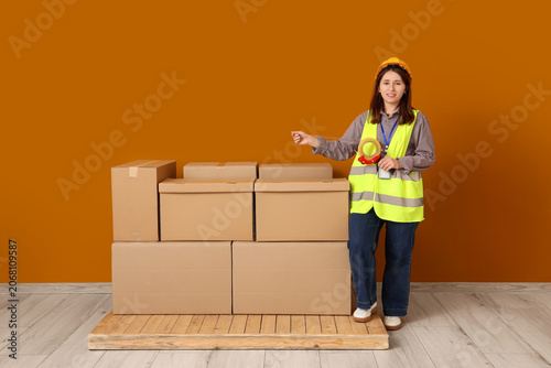 Young female warehouse work...