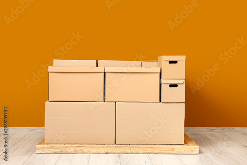 Cardboard moving boxes stac...