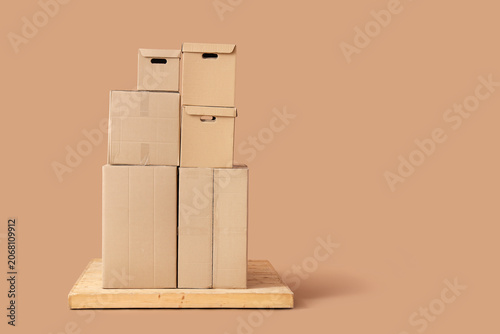 Stacked cardboard moving bo...
