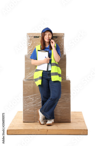 Smiling female delivery ser...
