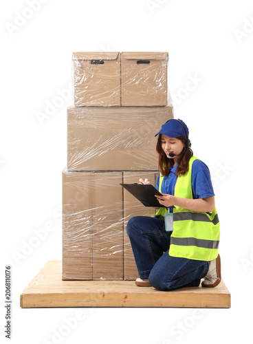 Young female warehouse work...