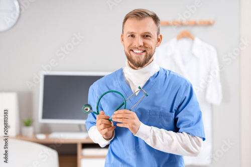 Male doctor with stethoscop...