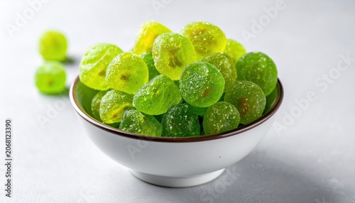 A Bowl of Bright Green Candied Grapes Featuring a Sugary, Translucent Texture in a Macro Close-Up
