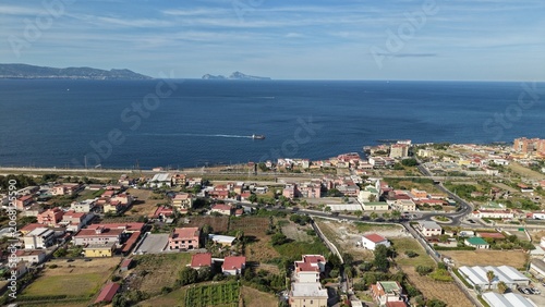 Bild auf Leinwand Aerial drone view of Torre del Greco coastal residential area with colorful buil