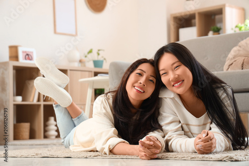 Beautiful young happy Asian...