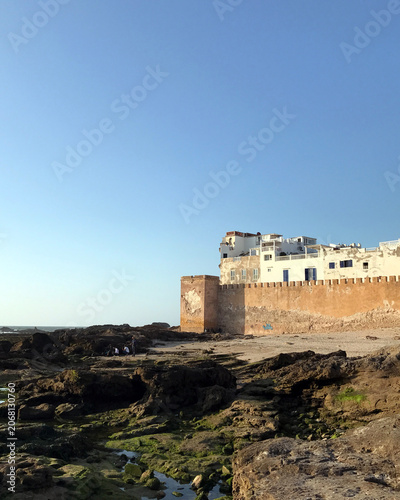 Essaouira Ancient City Walls and Whitewashed Buildings Over Rocky Coastline, Morocco