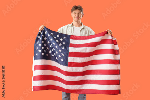 Young man with flag of USA ...