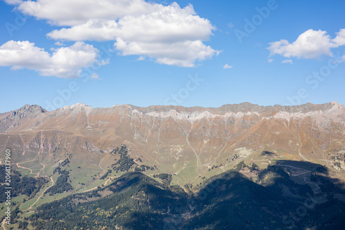 Horizontal distant caucasus mountain peaks under clear blue sky in Arkhyz Karachay Cherkessia Russia.