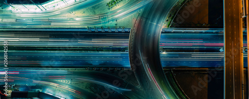 Quadro em tela Abstract urban mobility background showing fast moving traffic and modern city roads designed for technology marketing, future transportation, sustainable infrastructure, and finance concepts