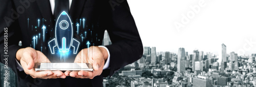 Fotografie Business professional showcasing digital innovation with rocket symbol above sma