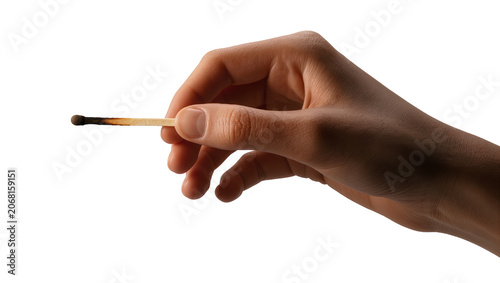 Fotografía Isolated human hand holding a single burnt wooden matchstick after the flame ext