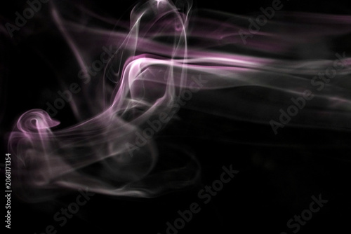 Fotografie Close up of incense smoke in the air