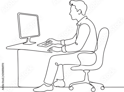 Man sitting at desk working on computer