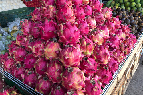 pile of dragon fruit in a fruit shop