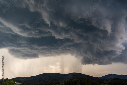 Thunderstorm cell over Brotjacklriegel and Sonnenwald in Bavarian Forest, Lower Bavaria, Germany