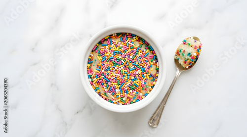 viral dot cake with colourful sprinkles with a spoon