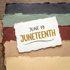 A torn paper sign reading June 19 Juneteenth on a wooden background with colorful paper strips
