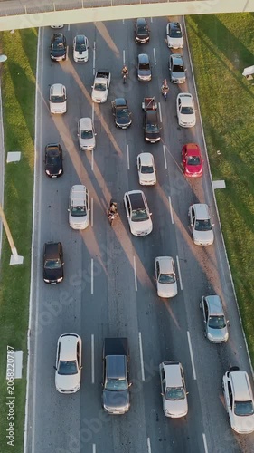 Top Down Aerial View of City Traffic Jam with Multiple Vehicles on Multi-Lane Highway Avenue Street Road