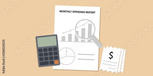Financial charts, calculator, receipts and magnifying glass in review workspace. Monthly spending report analysis concept. 