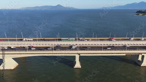 Aerial View of Pedro Ivo Campos and Colombo Salles Bridges with City Traffic and Ocean Coastline in Florianopolis Santa Catarina Brazil