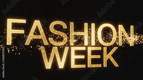 Glowing golden fashion week text on a dark textured background