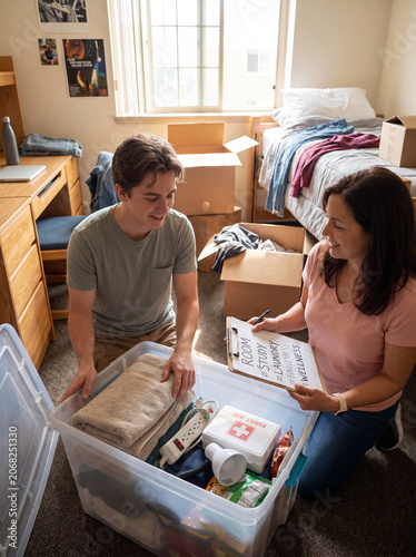 College dorm move in checklist with student unpacking supplies and first aid kit