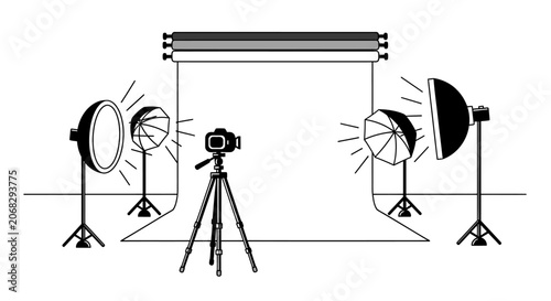 Professional photography studio setup with camera and lighting equipment.