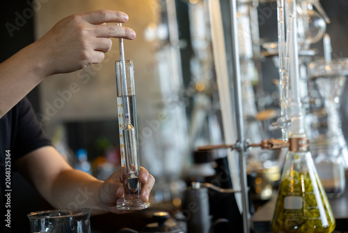 Canvastavla Laboratory distillation alcohol measurement glassware hand liquid science chemis