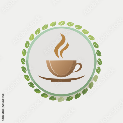A steaming hot cup of coffee or tea with aromatic steam rising in a circular frame adorned with green leaves