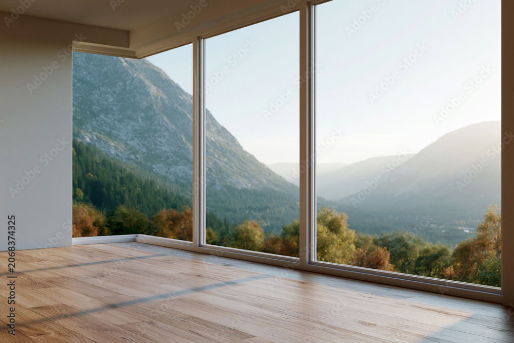 Fototapeta premium Bright sunlight streams through floor-to-ceiling windows. Mountain peaks rise behind a lush, forested valley. Warm wood flooring reflects natural light softly. No people, no animals - quiet