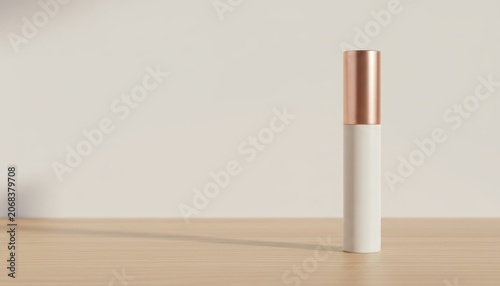 Sleek cosmetic product standing on a light wood surface against a neutral studio background
