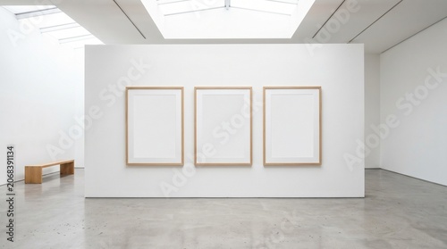 Three Empty Blank Picture Frames Mockup on White Art Gallery Wall