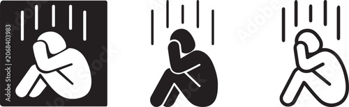 Depressed man sitting down icon set vector.