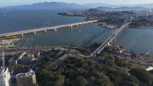 Aerial Panorama of Hercilio Luz Bridge and Colombo Salles Bridge over the Sea under Blue Sky in Florianopolis Santa Catarina