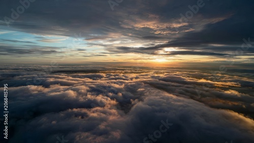 Dramatic Sunset Over a Sea of Clouds, Aerial View