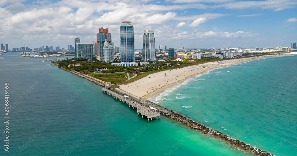 Fototapeta premium Miami city panorama with skyscrapers. Miami beach waterfront. Miami pier with south pointe. Miami shoreline.