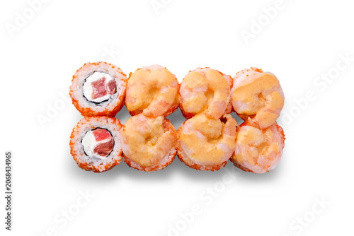 Overhead close-up of sushi assortment on white isolated background, variety rolls with eel, shrimp, salmon, cucumber, avocado and cream cheese, clean plate, Japanese meal